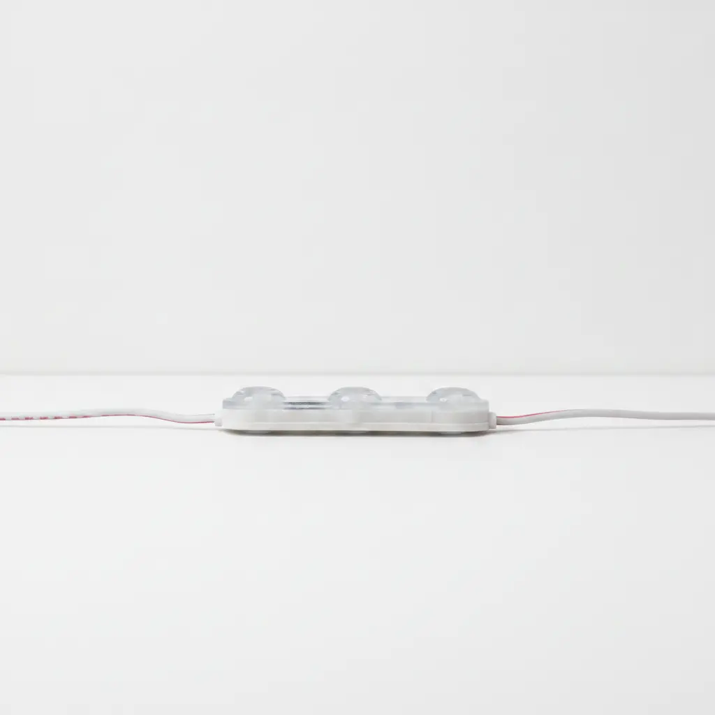 Profil latéral du module LED 12V 1,1W IP67 montrant sa faible épaisseur et le câble rouge et blanc